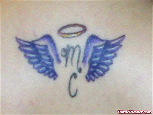 Blue Ink Virgo Zodiac Sign And Blue Angel Wings Tattoo