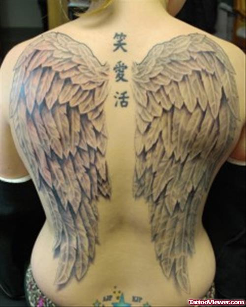 Awesome Grey Ink Wings Tattoos On Back For women