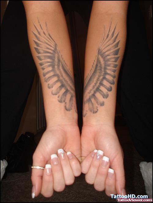 Grey Ink Wings Tattoos On Wrists