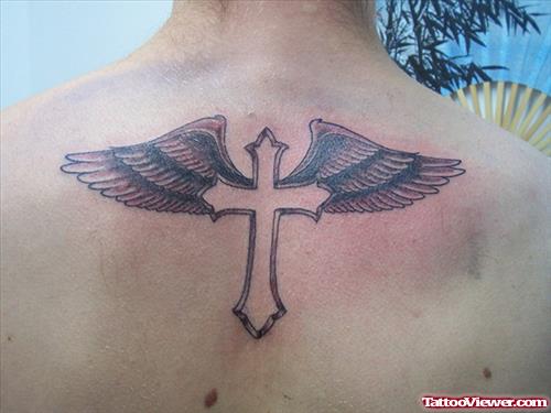 Grey Ink Cross With Wings Tattoo On Upperback