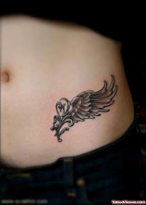 Grey Ink Angel Wings Tattoos On Hip