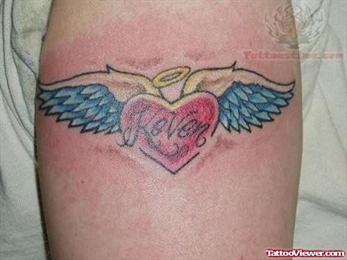Heart Wings Tattoo On Muscle