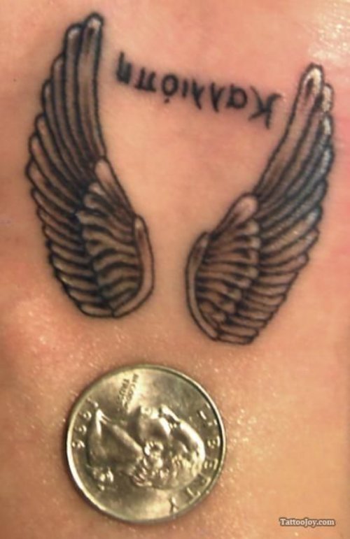 Grey Ink Wings Tattoos