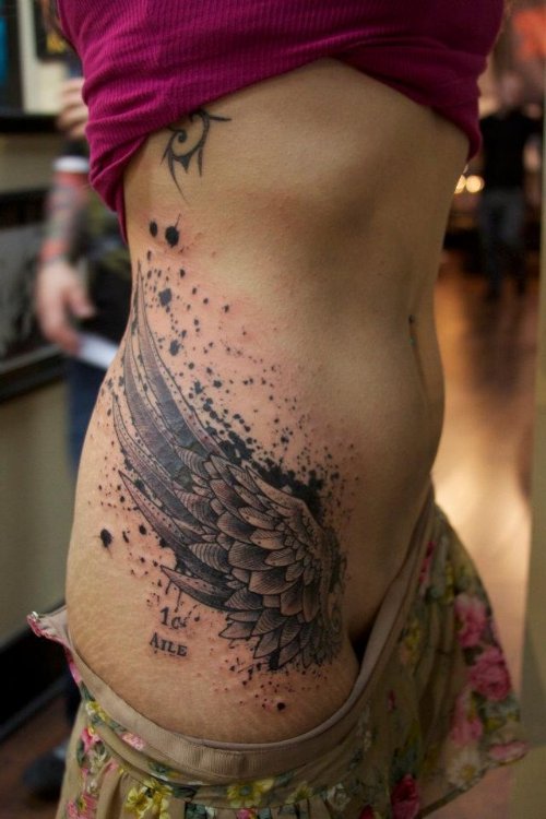 Grey Ink Angel Wing Tattoo On Side