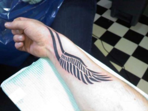 Black Ink Wing Tattoo On Right Forearm