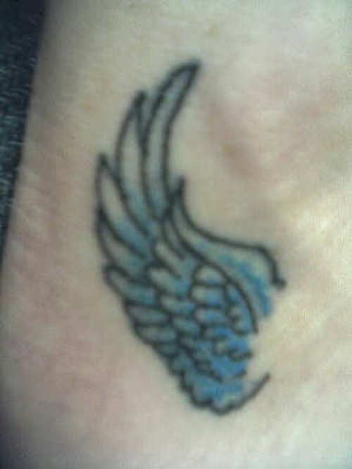 Small Blue Wing Tattoo