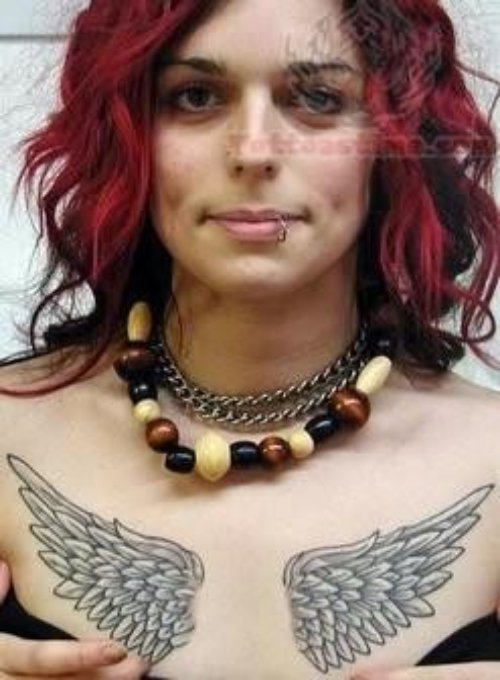 Elegant Wings Tattoo On Girl Chest