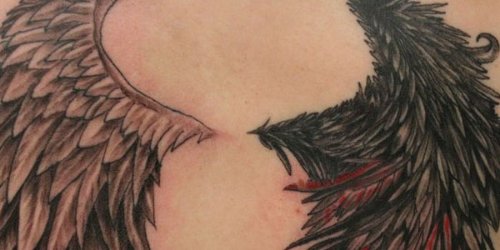 Attractive Angel And Devil Wings Tattoo Design