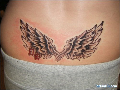 Amazing Grey Ink Wings Tattoos On Lowerback