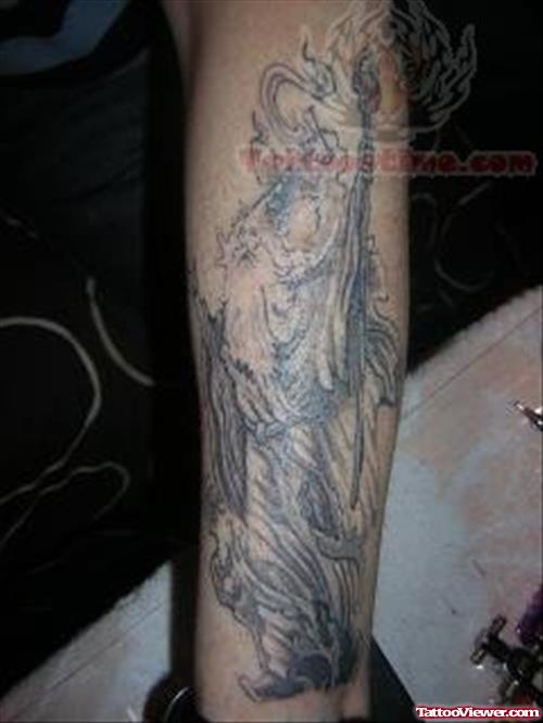 Grey Ink Wizard Tattoo