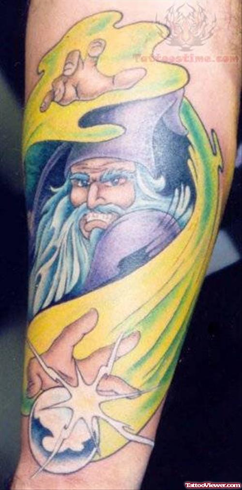 Yellow Ink Wizard Tattoo