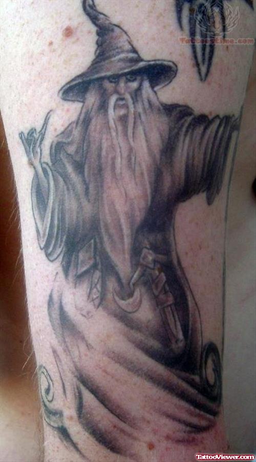 Grey Ink Wizard Tattoo On Arm