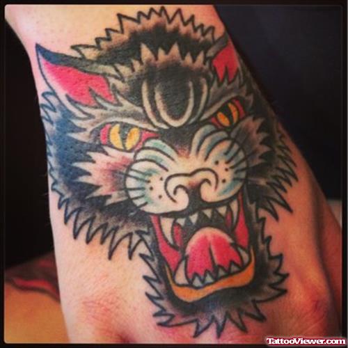 Colored Wolf Head Tattoo On Left Hand