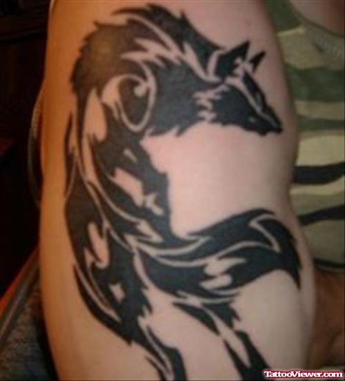 Black Ink Tribal Wolf Tattoo