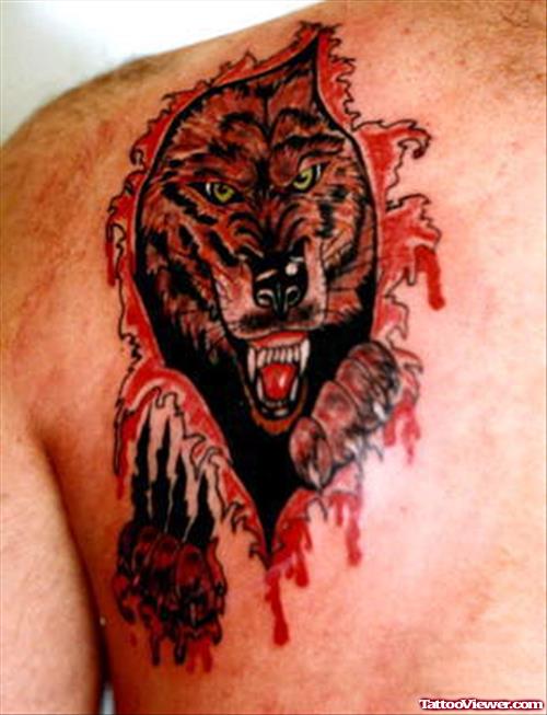 Ripped Skin Wolf Tattoo On Left BAck Shoulder