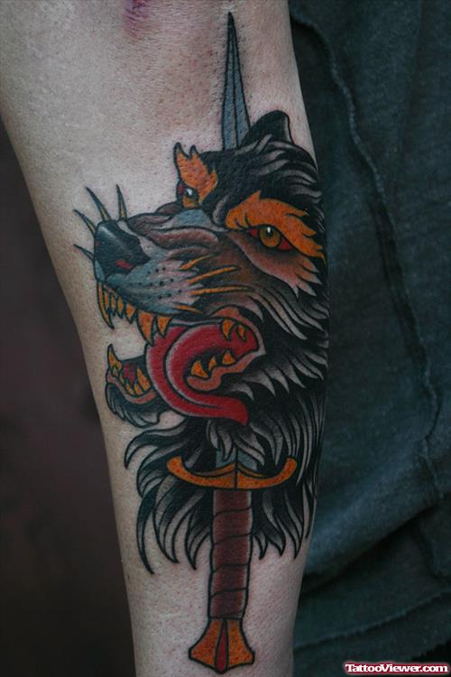 Wolf Head With Dagger Tattoo On Sleeve