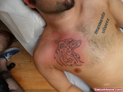 Tribal Wolf Tattoo On Man Chest