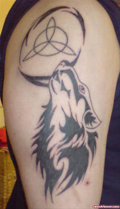 Black Ink Tribal Wolf Head Tattoo On Half Sleeve