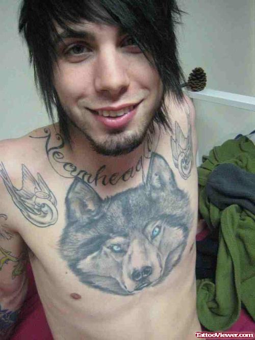 Awesome Grey Ink Wolf Head Tattoo On Man Chest