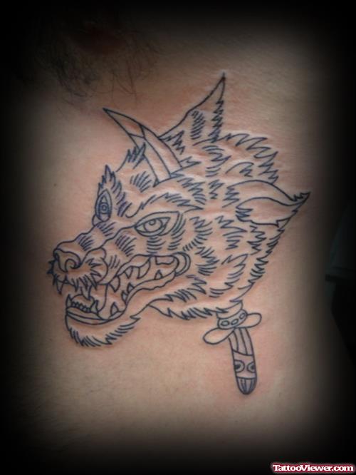 Grey Ink Wolf With Dagger Tattoo