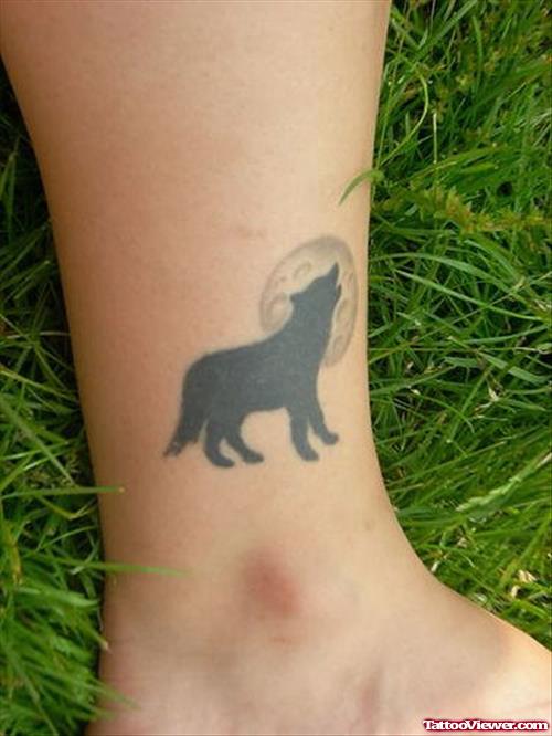 Moon And Howling Wolf Tattoo On Leg