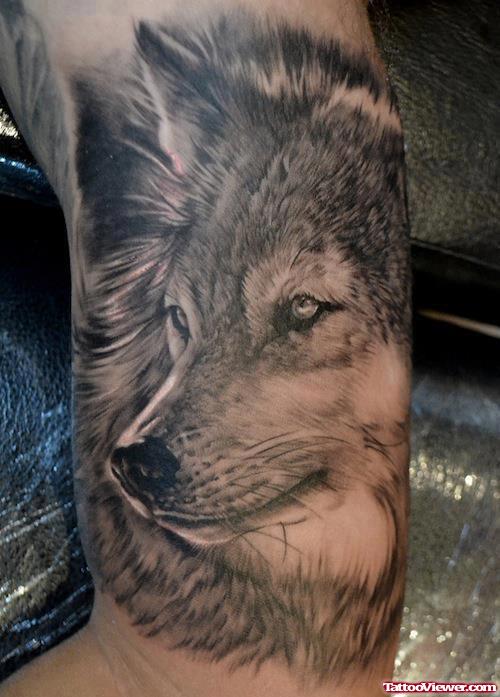 Grey Ink Wolf Head Tattoo On Half Sleeve