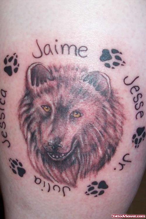 Paw Prints and Wolf Tattoo