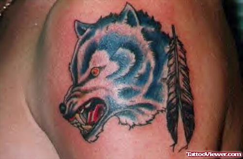 Feathers And Wolf Head Tattoo On Shoulder