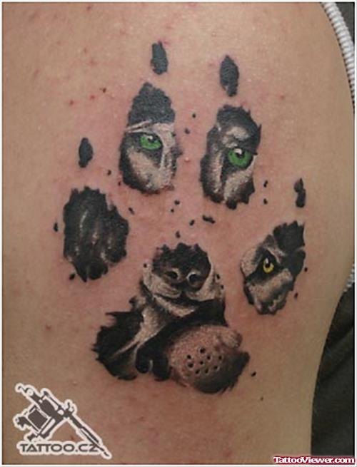 Paw Print And Wolf Face Tattoo