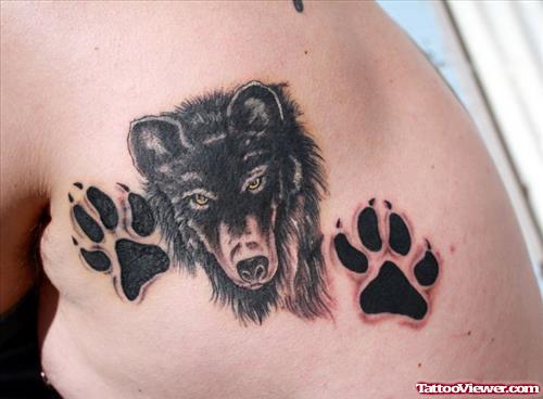 Black Paw Prints and Wolf Head Tattoo On Chest