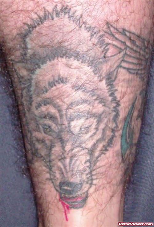Small Wolf Tattoos On Leg