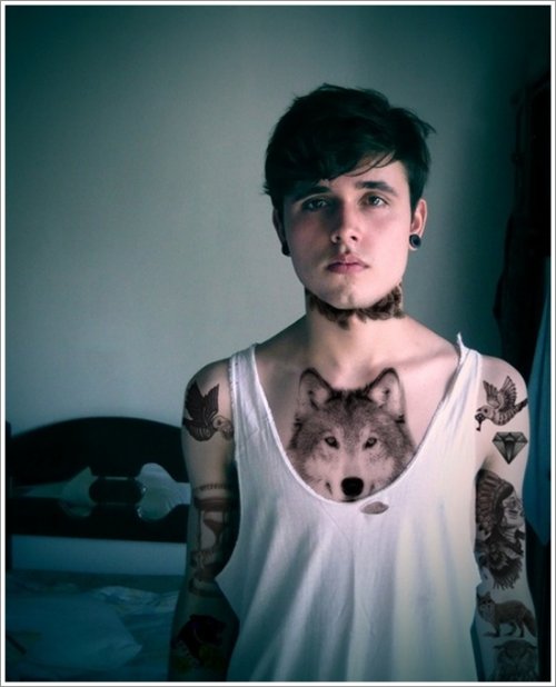 Inspiring Grey Ink Wolf Head Tattoo On Man Chest