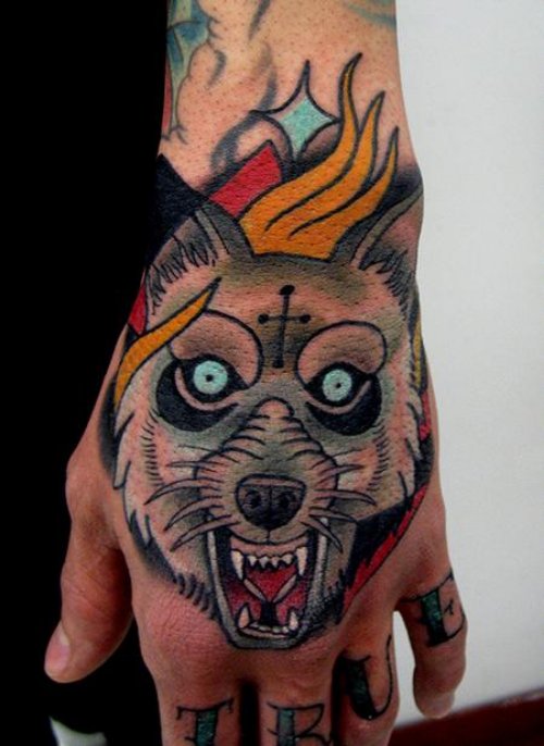 Grey Ink Wolf Tattoo On Left Hand