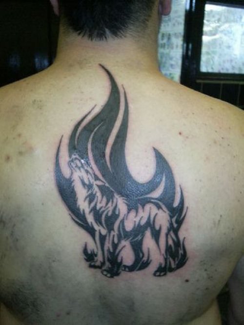 Tribal And Wolf Tattoo On Back