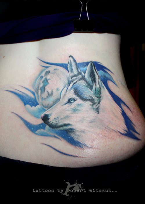 Blue Ink Wolf Tattoo On Lowerback