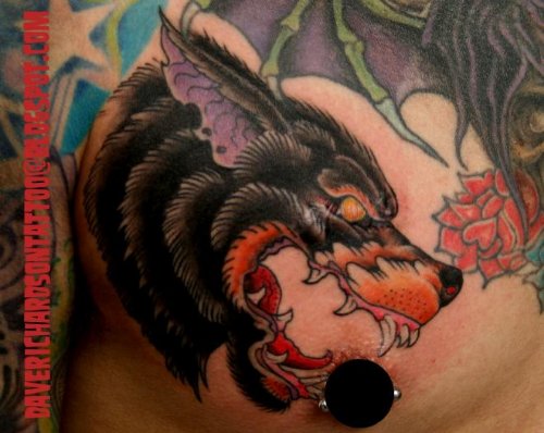 Traditional Wolf Head Tattoo On Man Chest