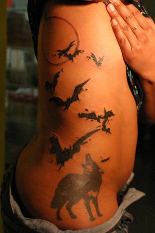 Flying Bats and Wolf Tattoo On Side Rib