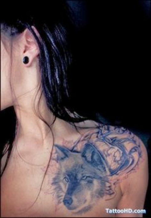 Grey Ink Wolf Tattoo On Collarbone