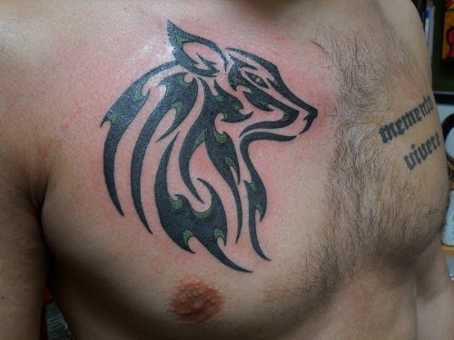 Cool Black Tribal Wolf Tattoo On Man Chest