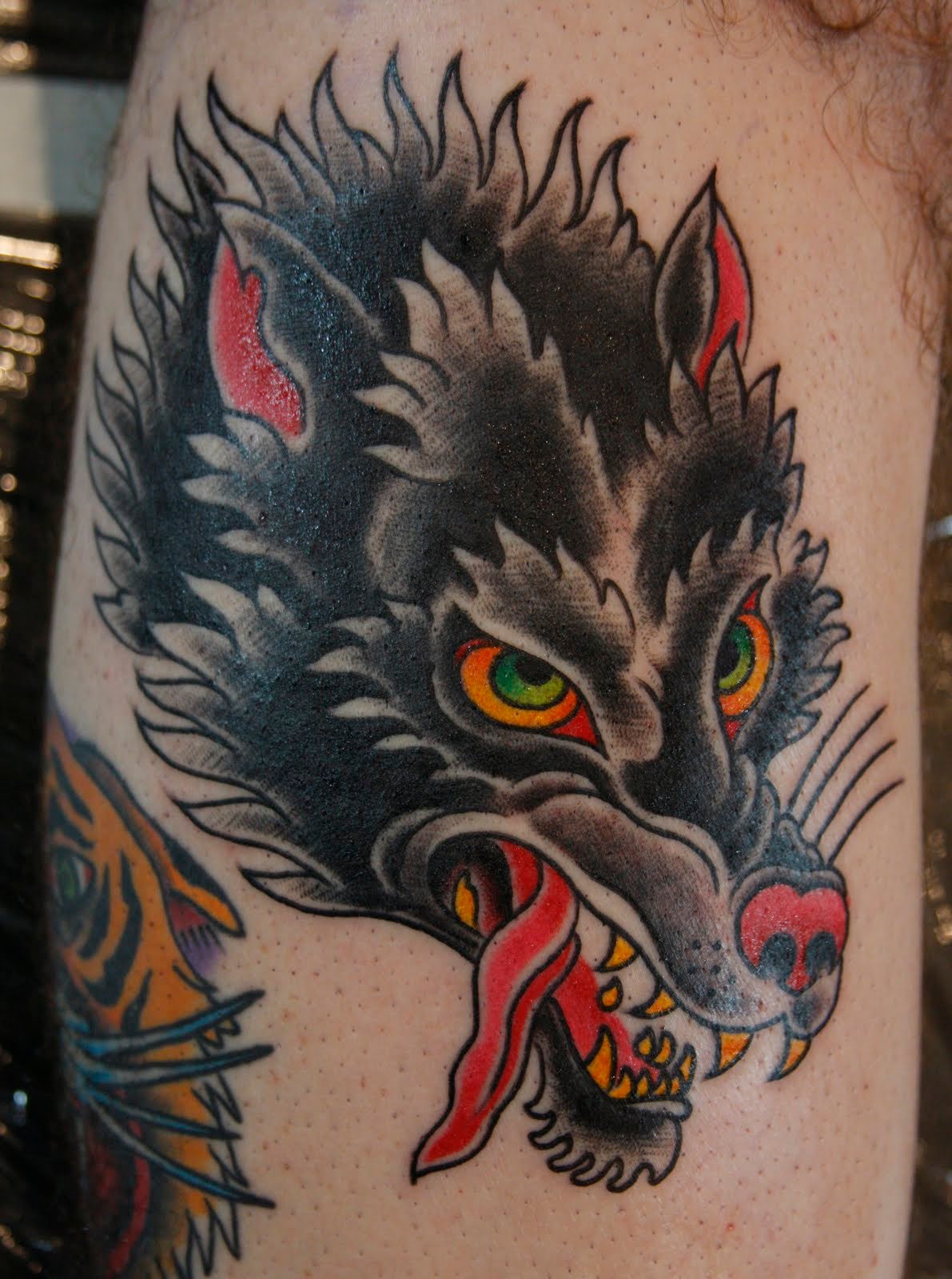 Classic Black Ink Wolf Head Tattoo