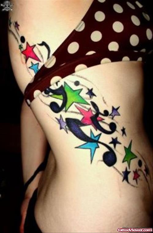 Awesome Colored Stars Women Tattoo