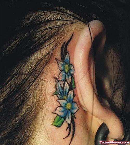 Tribal And Blue Flowers Tattoo Behind Ear For Women