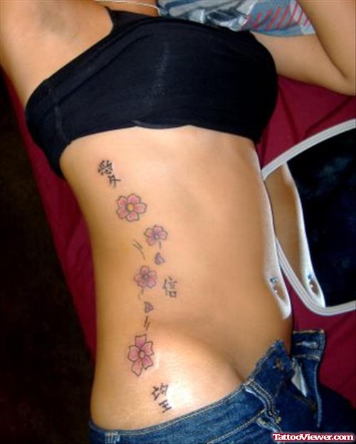 Cherry Blossom Flowers Tattoo On Side For Women
