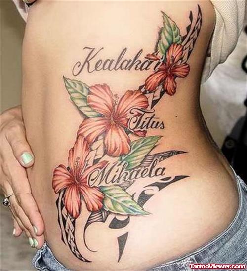 Polynesian And Flowers Women Tattoo On Side Rib