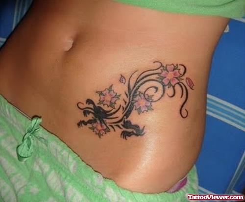 Tribal Dragon And Flowers Women Tattoo