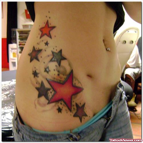Colored Stars Side Rib Tattoo For Women