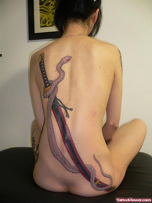 Dagger And Snake Tattoo On Back For Women
