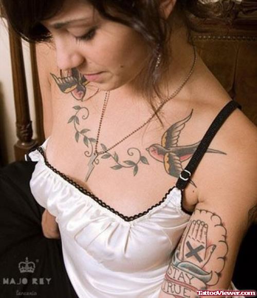 Colored Flying Birds Tattoo On Girl Chest