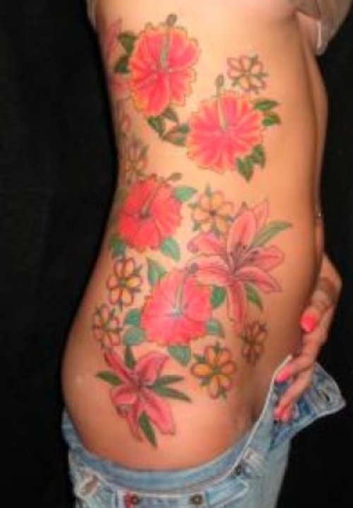 Colored Flowers Side Rib Tattoo For Women
