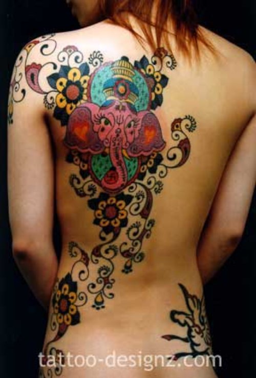 Flowers And Lord Ganesha Head Back Shoulder Tattoo